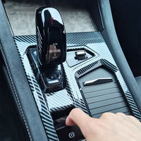 Accessoires d'intérieur en fibre de carbone ABS automobile OEM pour 2023 Geely Lynk & Co 03 Cadre de garniture de panneau de levier de vitesse