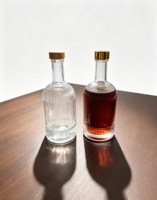 Bouteille en verre de haute qualité 300ml 350ml pour spiritueux, petite bouteille de vin en verre transparent, logo personnalisé OEM ODM pour mini whisky, brandy, usage cadeau