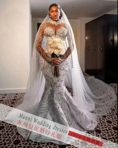 Nouvelle Robe de Mariée Style Africain pour le Commerce International, Robe de Mariée Sirène à Manches Longues et Col en V Profond en Dentelle, Vente en Gros - Product Image 3