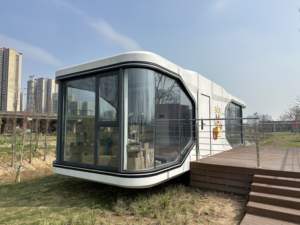 Maison moderne préfabriquée à deux étages Conception efficace de l'espace terrestre avec pièce supplémentaire au-dessus du garage pour les petites villes Maisons de roulottes - Product Image 2