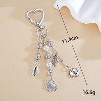Breloque de sac vintage Y2K avec fermoir cœur, pompon perlé, pendentif étoile, coquillage et flocon de neige, porte-clés pour sac à main femme, cadeau