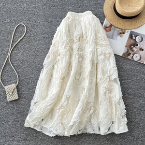 Jupe mi-longue élégante pour femme, taille haute, style rétro, polyvalente et amincissante, nouvelle collection Printemps 2026, vente en gros pour boutiques - Product Image 1