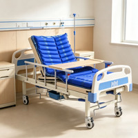 Lit médical manuel semi-courbé à levage assisté avec barrières latérales anti-chute, conception mobile et poteau porte-perfusion pour le soin des patients post-opératoires