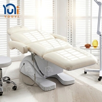 Lit de beauté électrique de luxe pour esthéticienne, avec base en plastique courbée, pour soins du visage, cils et massage en spa
