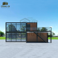 Diseño Personalizado de Casa Contenedor de 2 Pisos para Construcción Modular Rápida, con Muro Cortina de Vidrio y Estructura Duradera