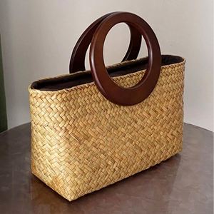 2025 Summer Hot Selling Casual Natural Grass Straw <b>Basket</b> Bag with Wood Handle Literary Retro Travel Beach Handbag - Product Image 4