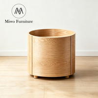Table de chevet moderne et simple noire avec tiroir, meuble de rangement circulaire, table de chevet design pour chambre à coucher