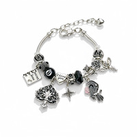 Bracelet Fanhua Jewelry, best-seller TikTok, en acier inoxydable plaqué or, étanche, avec motifs Corbeau, Rose, Pique et Boule 8