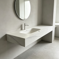 Évier de salle de bain monobloc moderne blanc sur mesure, en pierre frittée, avec bordure sans joint, fabriqué directement en usine, respectueux de l'environnement, idéal pour les hôtels