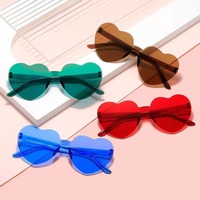 Lunettes de soleil sans monture tendance 2026 pour femme, colorées (blanc, rouge, champagne) – Idéales pour les soirées branchées et les accessoires photo