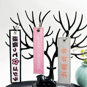 Porte-clés en tissu personnalisables avec broderie de logo sur mesure pour la vente en gros / Étiquettes de clés personnalisées - Product Image 4