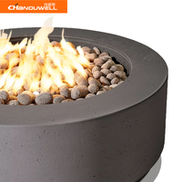 Table de feu ronde de couleur gris foncé au design minimaliste pour l'extérieur, foyer extérieur décoratif pour hôtel