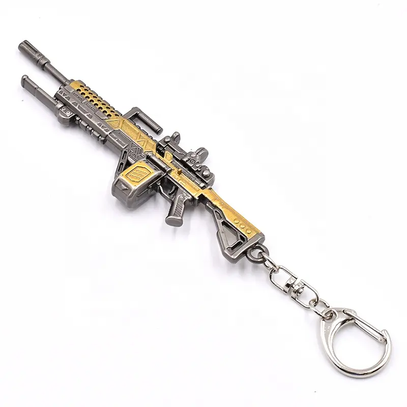 Célèbre jeu de tir apexex héros se concentrent sur la mitrailleuse légère artisanat en métal pistolet moule porte-clés peinture jaune 11cm fabricants