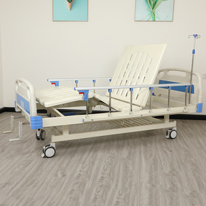 Cama de enfermería manual con doble manivela, altura ajustable, con respaldo y elevación de piernas para uso en el hogar o en la sala de estar. - Product Image 1