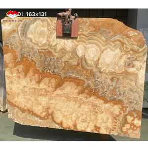 หินอ่อนลายไม้สีเหลืองธรรมชาติจากเปอร์เซีย หินอ่อนออนิกซ์สีขาวเปอร์เซีย แผ่นใหญ่สำหรับปูพื้นและบุผนังภายในห้องรับประทานอาหารในวิลล่า - Product Image 1