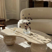 Table basse ovale en pierre naturelle massif, style mid-century moderne, en travertin