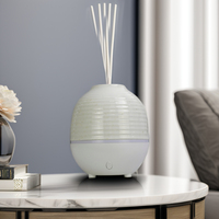 Meilleure vente 100ml blanc céramique électrique diffuseur d'huiles essentielles ultrasons USB humidificateur d'air parfumé maison diffuseur de parfum