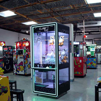 Machine d'arcade moderne CLAW BAE au design minimaliste, attrape-œufs LED à monnayeur pour événements, locations et centres commerciaux