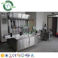 Machine de remplissage automatique pneumatique pour petits tubes, pots, bocaux, confitures, crèmes, sauces, sirops, pâtes, miel avec trémie de mélange