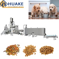 Machine d'extrusion pour la production de croquettes pour animaux de compagnie (aliments secs pour chats, aliments pour animaux, aliments pour poissons flottants ou coulants) et de croquettes pour chiens (aliments humides)