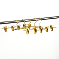 Cintre robuste en métal doré pour jupes cintres en métal pour pantalons
