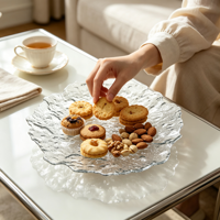 Moderne getextureerde glazen fruit schaal met golvende rand, decoratieve snack schaal, aangepaste logo's, gepolijst, geschikt voor thuis, hotel en restaurant.