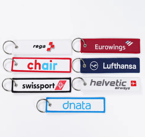 Bán Buôn Máy Bay Thương Hiệu Logo Máy Bay Phản Lực <span class=keywords><strong>Tag</strong></span> Chuyến Bay Thương Hiệu Thêu Dệt Vải Móc Khóa Hành Lý <span class=keywords><strong>Tag</strong></span> Tùy Chỉnh Thêu Keychain - Product Image 1