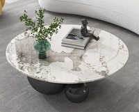 Offres Spéciales Table basse à cadre sphérique en acier inoxydable Table basse noire créative à la mode Table à thé ronde de luxe en pierre frittée