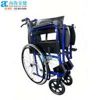 Kursi Roda Manual Baja AJ-801 Warna Biru Cantik dengan Rem Tangan, Sandaran Kaki Lipat, Desain Menarik, Ideal untuk Alat Bantu Mobilitas