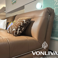 Canapé d'angle sans accoudoirs Vonliva en cuir écologique et chenille, avec fonction massage et rembourrage en éponge, pour salon