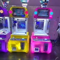 Vente en gros usine : Machine à griffes à thème pêcheurs de dattes rose de haute qualité - Jeu d'arcade à monnayeur pour la capture de peluches, idéal pour les centres commerciaux