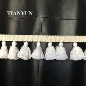 Nouvelle vente en gros de robe blanche en dentelle 100% rayonne avec franges pour rideau et robe de femme