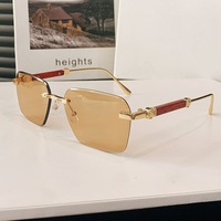 Lunettes de soleil photochromiques sans monture, branches effet bois, ferrures dorées, verres dégradés UV400, style tendance, vente en gros, logo personnalisé