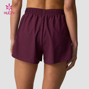HUCAI Vêtements de sport personnalisés Respirant Cordon de serrage Léger Séchage rapide Double couche 2 en 1 Shorts de sport de course à pied pour femmes - Product Image 2