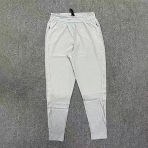 Pantalon de course pour homme à séchage rapide, respirant, avec coutures côtelées et poches, idéal pour l'entraînement de marathon - Product Image 2