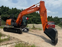 Excavatrice sur pneus d'occasion Hitachi ZX 130 de 13 tonnes, 98% neuve, excellente qualité, en stock