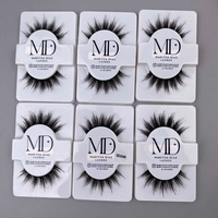 Faux cils naturels effet œil de chat, légers et volumineux, avec bande en coton, pour usage quotidien, en fibres synthétiques douces.