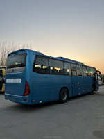 Bus électrique populaire pas cher Shenlong Chine Bus utilisé nouveau transport grand bus de ville 50 sièges bus automatique à plancher bas à vendre