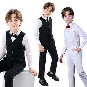 Completo formale da ragazzo elegante a 4 pezzi gilet su misura in bianco e nero con papillon abbigliamento da ragazzo per eventi di matrimoni - Product Image 1