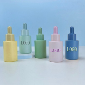 Hot Sale 1oz Colorful Massage Essential Oil Bottles Custom Logo 30ml Thick Bottom Luxury Glass Dropper Bottle - Product Image 1