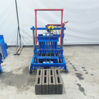 Machine de fabrication de blocs creux mobiles non cuites de petite taille pour la Côte d'Ivoire, équipement de fabrication de briques perméables en ciment à moteur bleu pour la protection des pentes