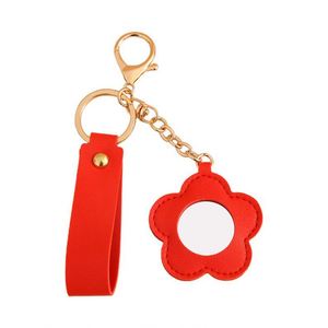 Porte-clés en cuir PU léger en forme de fleur et de cœur, mini miroir de luxe, pendentif cadeau, porte-badge, logo personnalisé - Product Image 1