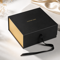Boîte cadeau pliable rigide en carton avec couvercle rabattable et doublure en satin noir pour emballages de luxe et cosmétiques haut de gamme