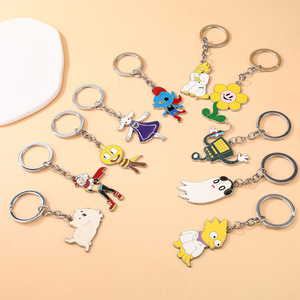 Nouveau porte-clés pendentif de personnage de dessin animé légendaire avec motif Undertale Little Flower Dog pour cadeaux d'affaires - Product Image 2