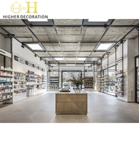 Comptoir de pharmacie en verre, style béton moderne, pour pharmacie à aménagement ouvert, avec étagères sur mesure