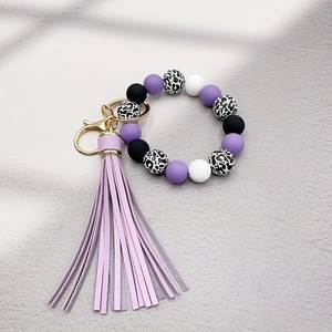 Bracelet créatif en silicone avec des perles rondes en alliage de léopard, impression UV, long pompon doux, cadeau écologique pour hommes et femmes - Product Image 5