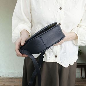 Nasman Women's Genuine Leather Saddle <b>Bag</b> Oval Vintage Crossbody Shoulder <b>Bag</b> Coffee Brown And Black All Seasons Casual Style - Product Image 3