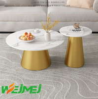 Ensemble de table basse ronde moderne en pierre frittée et base métallique de luxe avec hauteur réglable pour salon