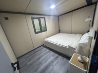 Maison conteneur préfabriquée extensible de 40 pieds avec panneaux sandwich en PU de 75 mm, 1 à 5 chambres, cuisine, maison mobile de luxe, chalet