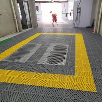 Meistverkaufte Rutschfeste PP-Kunststoff Ineinandergreifende Garagenbodenfliesen 40*40*2cm Verschleißfeste Belüftete Bodenbeläge für Autowäsche und Entwässerung